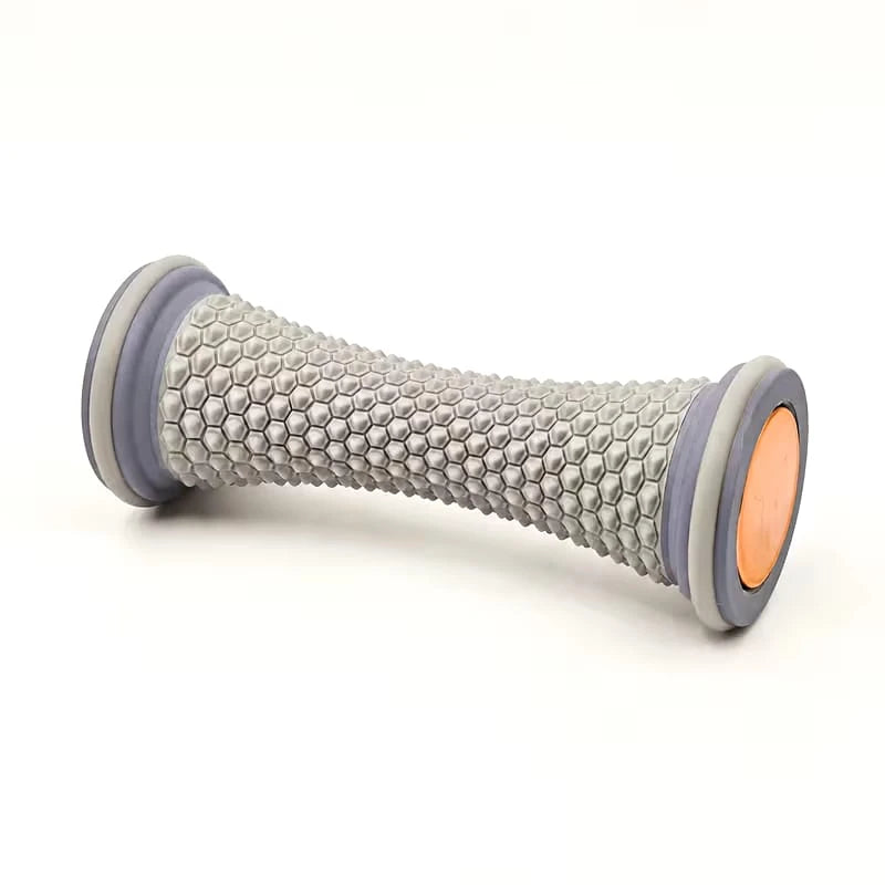 A gray textured foam roller with a honeycomb pattern, featuring purple-gray end caps and a bright orange inner core, shown on a white background.