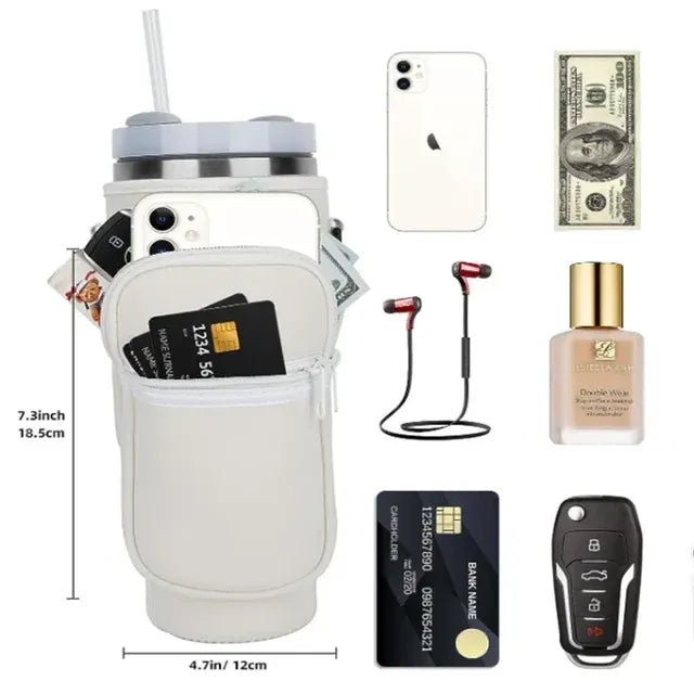 White cup holder with phone, cards, bottle, and other items on a white background